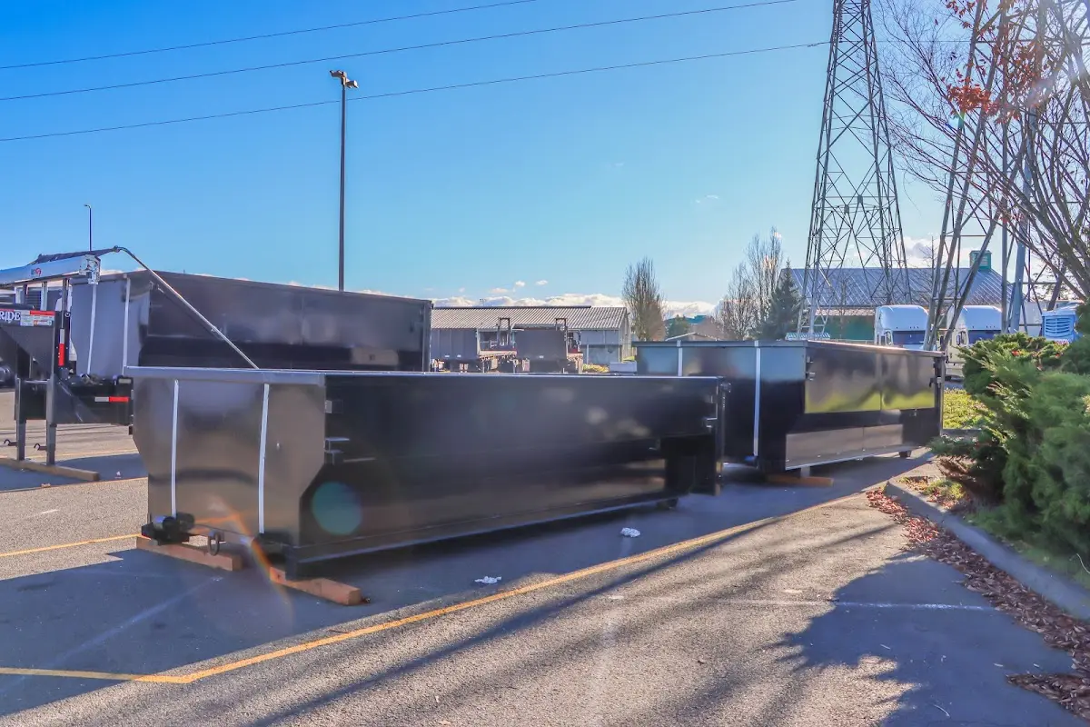 Roll-off dumpster ready for waste disposal at job site for Demolition Dumpster Rental in Glendale